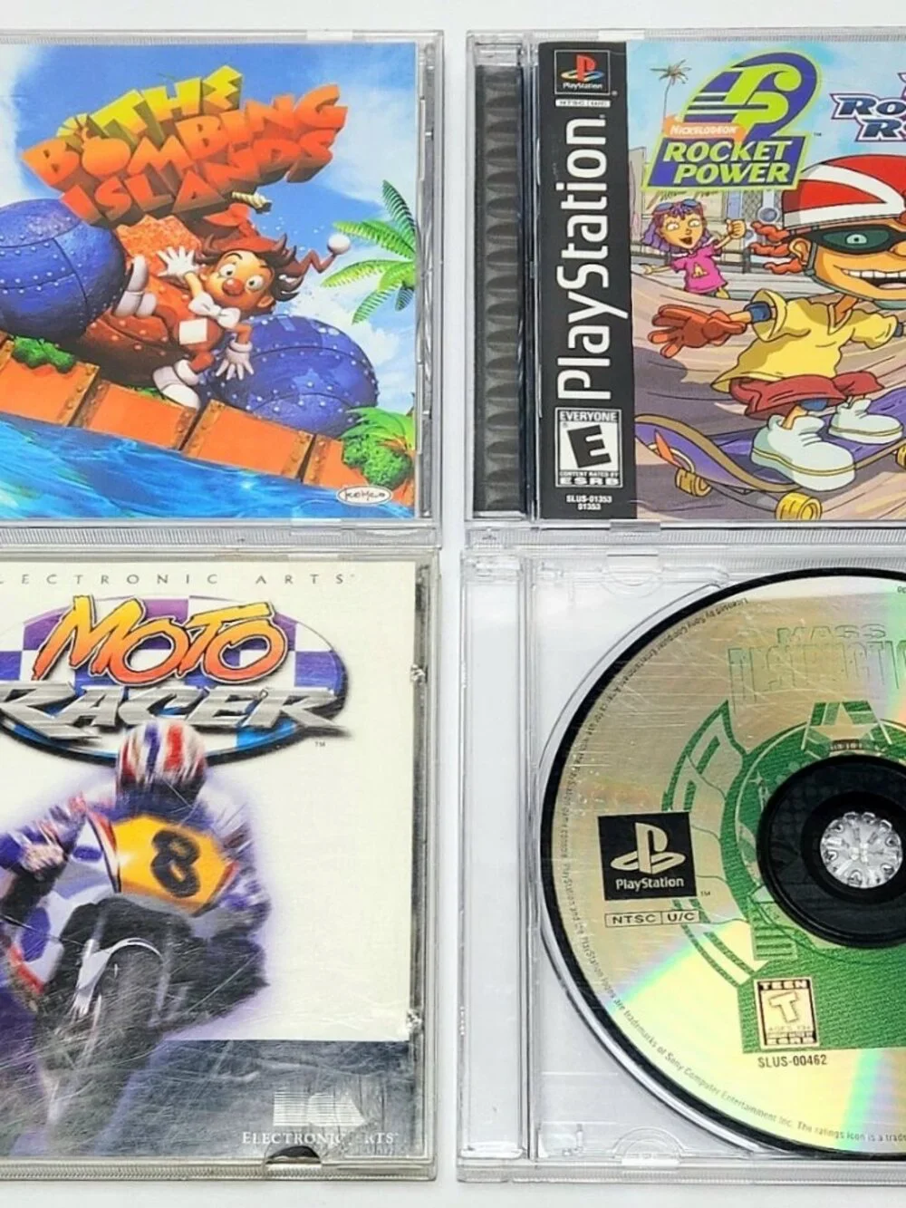 PlayStation PS1 Game Lot Bundle 4x Bombing Islands Team Rocket Rescue Moto Racer